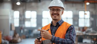 Professional stock photo of electrician wearing safety gear and hard hat, smiling, clean background, professional lighting, realistic photography style