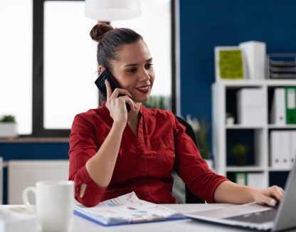 Smiling entrepreneur in red shirt talking on smartphone. Businesswoman explaining charts on the mobile phone looking at laptop computer. Successful manager happy with business results. SSUCv3H4sIAAAAAAAAA41V2a6bMBD9l3kGyePd+ZWqDwacBBXiiOW2UcS/dwwJNyRUapQHc8bMcubMcIe6ggNwH5AVEnPunc+lKo658xzzIAurpCxU8CVkUPkhwAEFt9ppyZRVyNIvg8L3dQmHO9RNM/ZD54c6XuBAli5cqtDNx1DVQ+xq39DTlEE/+GHsQ59e68/jMISuH2L5Cw4iA1/FInw/Vl3wbT/ULcXnJoObv7V12cXZiFx0xwWvwjX29XA9xyH2C1T6y+xnxhboGi+Vml8tYxPHroh/qCwK2vj2Np/amAoITWjDZXg4CrcQ2oe1X0PQY1GfXiOIKQUdwolqXap7sPPjnnCim6jsxyIdpuw/sZ+U3SlcSkrvPk2J1ib4mbwf4GTpDYYyL4QTucRjlXujMbfIJUqv0QSRuqe5tFbRDVYwusZs7rhQeeXc0ftKoCoLuqZZKYwwx1xJZ3NprMqt9DxHy1wR7LH0yIDS+fWbGtam+iidOJxTkynxOF6G7rYk38R49UVDPTv6pg8ZnH3f04XqAdCL164u68tp8VKSdGK7nC9xSNXNHCRy62qm8r0xgNZIYVDB2qAEKce447BqgwTkT7EvqfGkJM4ZsiRd+GgeSKlROM4lfEgHnBVCcmVgK0jgwjEjkDlYtQWorWbSupTYmypBSY5SG5USfBU6SMus1VZpeJU45cSU1NwmLjaDApy6iJSsFrBO1Lkma2rBHcZrE30VqoW5F9FqySXThqttAk9c4EfxDxOtg9fUnqg2nzPztFm+nbMFdsJtWXziEteurZD5ns0HZMQHratJrV1YIfPR6KfJyu/JfkLunefFYhi6aR7JtibjzOprpshRqf1AKLTi+5yisMm0yx5qh3s0Ea7ZtkokOcl9TtBYJnYaLdAq89FNqTXKXQIMSqvm3fNVh98vMnvPnRZdF/qxSTvMX69d/CKyMtgWgI67VNu4fizSkntjiDx9XzCULy2zjSMaAFp6VmU7EZO/V+o2zmg0rRTizZlN3zT+T2dbcjf+EDX9tdo6JDVLJ9i/HD7Us3HEnaVN8uZIotOadtq+o2ma/gL1Y0BuyQcAAA==
