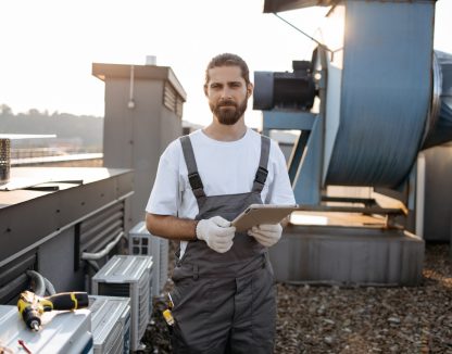 Serious construction worker in overalls and gloves standing and using modern tablet outdoors. Caucasian professional man surfing internet while working with devices on roof of factory. SSUCv3H4sIAAAAAAAACpRSy27cMAy8F8g/LHSuAduS9cgf9NBbb0EOtCyvhWilhR4pgmD/vZIfCyVAivYmDqkhOcP3h2+nExohaIkeT+8lyrE2JoXoIWpnM9x+33Gv7KR8jbx6TNsaAF1HatLReQ2mBkeIcrFwURm0yZgC39YkChFiCipUs4Qlxah8iE6+ZBhX1RKiOmf6D/XHLk9bfDoSazL/yCn0w05lvzLXPtTWKo0l+1MHqYwBq1wK6MhvPb8g/KXyRs6489t/EG6P57tyZ2XlW9nkVu3olVGwKbJvhMaRDmTmvBnYzBvCBGu4YLzpZqCDwGKY+bB22ajRy++s32XVaCeFNGlXafbqJJjwSV3QV/Dw4d/Va6ntuUJcXNaDOJikSzb6sgU6lEDGuSuMptg95zbqwBcIIZdPB147m+1xl6qPdXHVYGdFU7a+hB3GhDLKKcdUkIEwthdsl7TozLOOcwyYrsbBpErTu4+fb6xjbd8L0jK+VRzWFz8vOlf+y2/OVzF3n+/3nWv09Jf7Rj0WAresI5uH+0ddWqJJDkTQljdY9qIhHRGNED1vGFOE9sOMVcfzr9sfAAAA//8DAG38vGzWAwAA