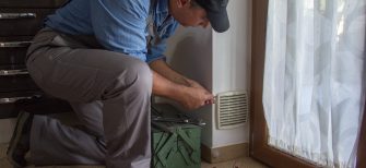 hvac technician uses WEX FSM to perform routine maintenance with an hvac maintenance repair contract