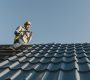 long-shot-man-working-roof