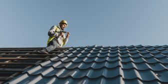 long-shot-man-working-roof