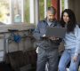 medium-shot-people-looking-laptop