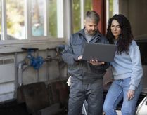 medium-shot-people-looking-laptop