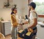 A plumber shakes hands with a homeowner