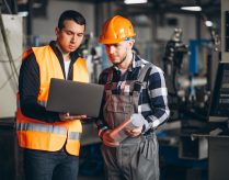 Two colleagues at a factory