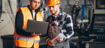 Two colleagues at a factory