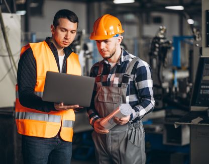 Two colleagues at a factory
